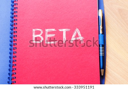 Beta text concept write on notebook