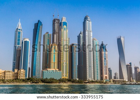 Modern buildings in Dubai Marina, Dubai, UAE in a summer day Royalty-Free Stock Photo #333955175