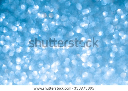 Abstract blue winter bokeh background. Christmas abstract background