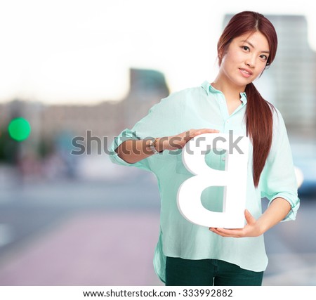 happy chinese woman with b letter