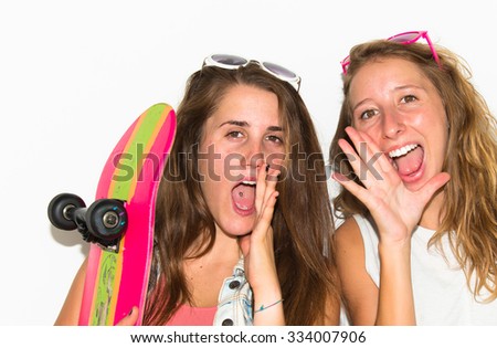 Two friends with their skateboards shouting