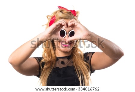 Woman making a heart with her hands