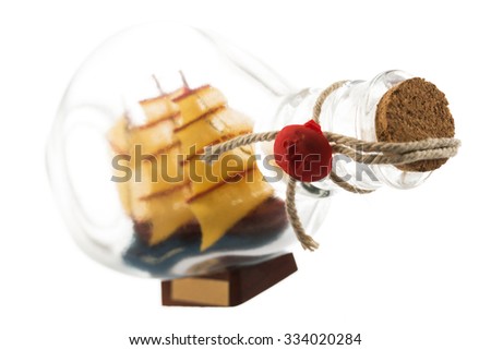 Ship in a bottle souvenir isolated on white background