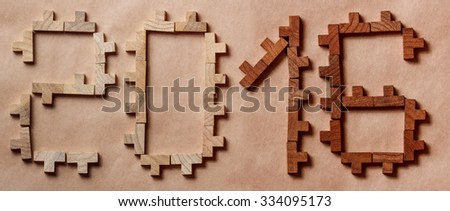 2016 word written with wooden bricks on brown backdrops