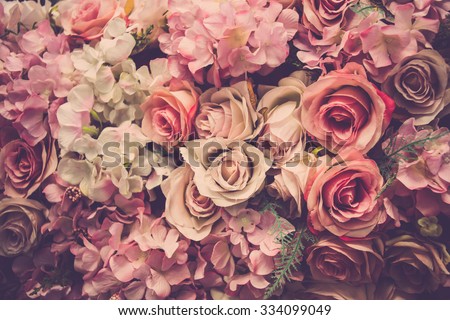 Pink roses background. Retro filter. Royalty-Free Stock Photo #334099049