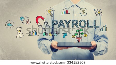 Payroll concept with young man holding a tablet computer 