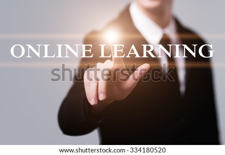 business, technology, internet and networking concept - businessman pressing online learning button on virtual screens