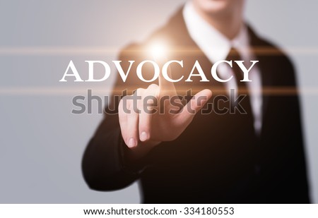 business, technology, internet and networking concept - businessman pressing advocacy button on virtual screens