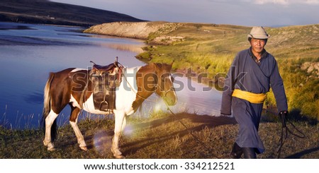Horse Man Bringing The Horse Toward The Camera Concept