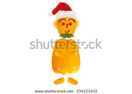 Creative food concept. Funny portrait of a Santa Claus made of fruits and vegetables.
