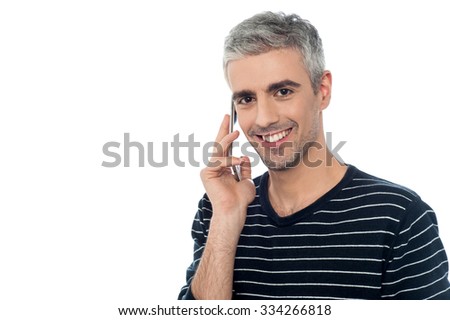 Handsome man talking on the cell phone