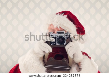 Santa is taking a picture against room with wooden floor