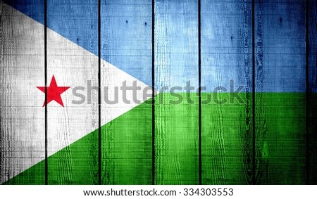 Djibouti Flag on old wood texture background