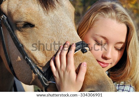 close-up portrait of teenage girl and horse 