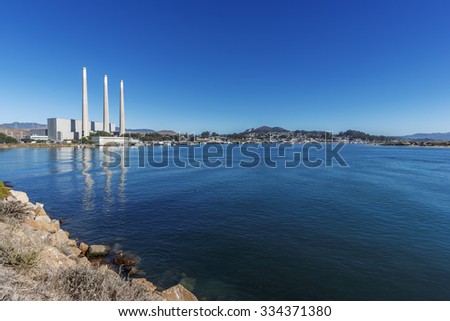 The iconic Dynegy power plant in Morro Bay, California, as seen from the Morro Rock, is now defunct. Currently off the market as of 2015, but the city of Morro Bay, maybe planning on making an offer.