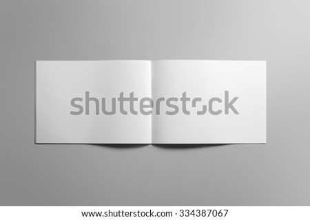 Blank landscape brochure magazine isolated on cardboard background, with clipping path, changeable background
 Royalty-Free Stock Photo #334387067