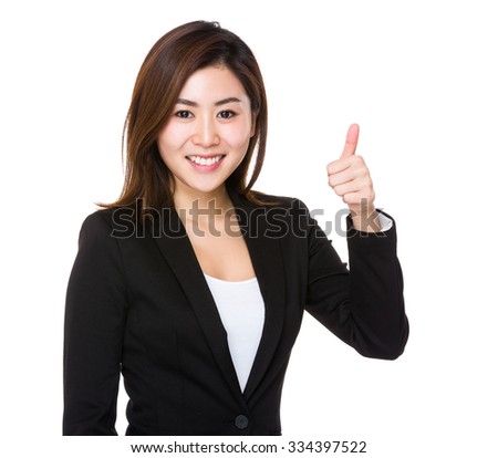 Young Businesswoman show with thumb up