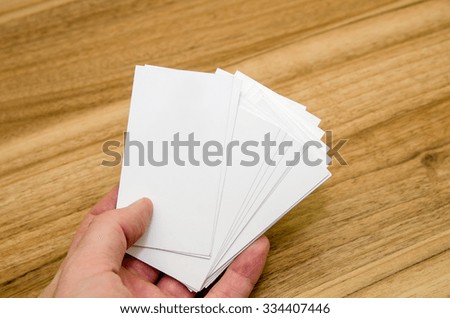 business card presentation for promotion on wooden table