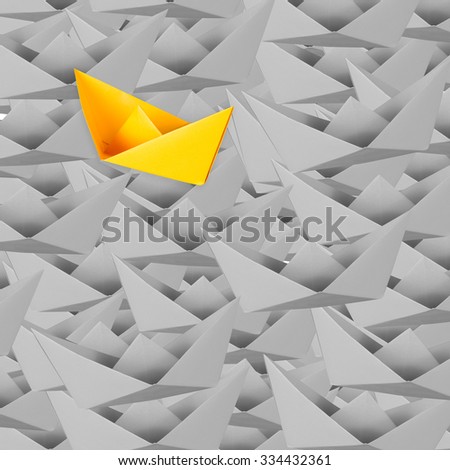 leadership concept with paper boat 