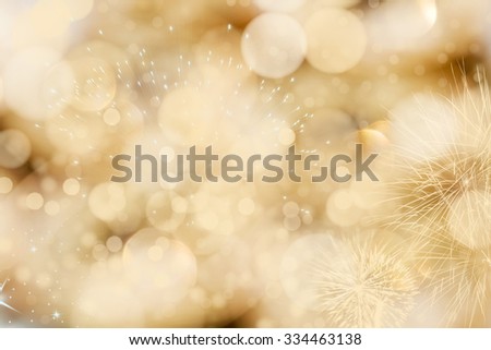 Abstract bokeh holiday background with fireworks and stars