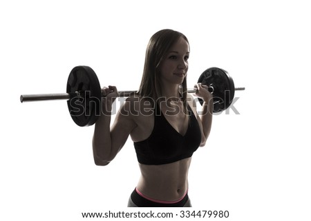 one beautiful fitness woman  fitness sport excercising squats with barbell silhouette on white background