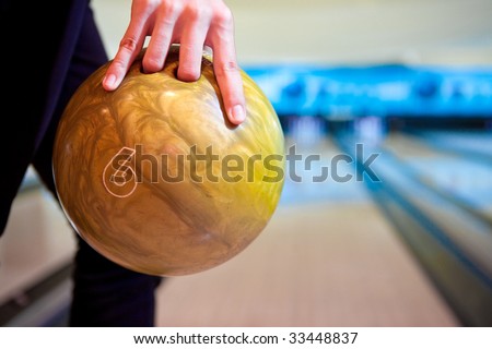 Hand with the bowling ball