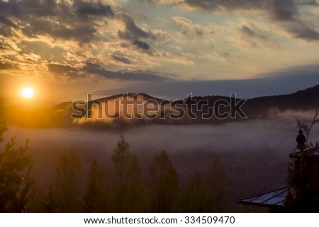 Daybreak in autumn Carpathian mountain village outskirts, Ukraine.