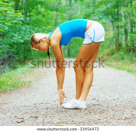 Woman runner exercising, from a complete series of photos.