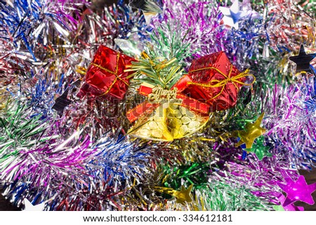 christmas gifts  decoration on the Tinsel background.