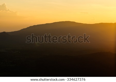 Light of sunset with mountains at Wang Nam Kheaw