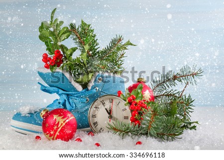 Christmas clock with boots and Holly leaves