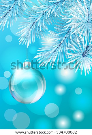 Glass Christmas ball on white tree backdrop
