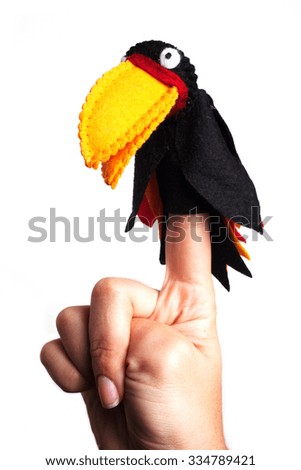 Detail of brazilian animals (toucan bird) puppets in the finger.