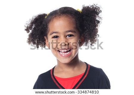 An Adorable african little girl with beautiful hairstyle isolated over white Royalty-Free Stock Photo #334874810