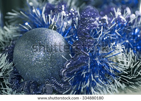 Theme of new year or merry christmas. Color ball and color tinsel for new year card. Tone correction