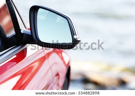 Red car, outdoors Royalty-Free Stock Photo #334882898