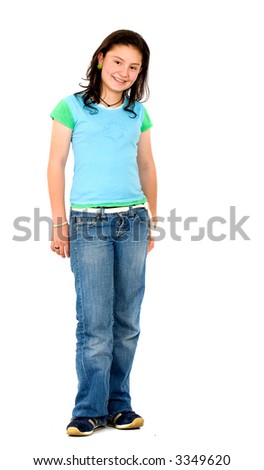 casual teenager standing smiling - isolated over a white background