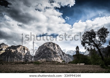 Meteostation in rocky landscape in the Fan Mountains. Pamir. Tajikistan, Central Asia. Toned.