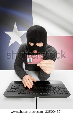 Hacker with ID card in hand and flag on background - Texas