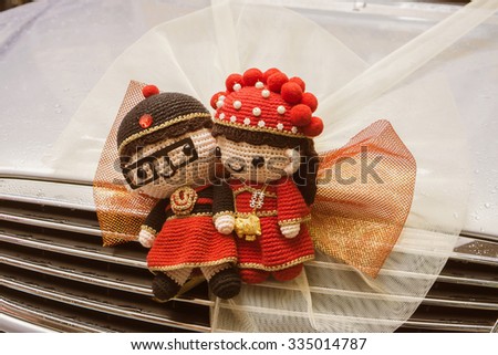 Chinese Wedding doll ,Trapped in car,wedding ceremony in hong kong ,china,Traditional Chinese wedding scenes,vintage color.