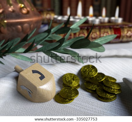 hanukkah close up with candles,spinning top and gold antique coins