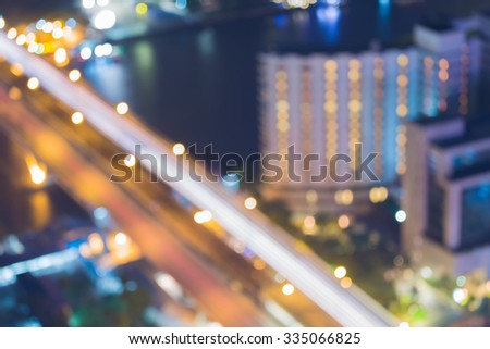 Abstract blurred bokeh light, aerial view of city bridge at night