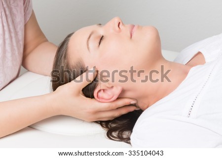 health care and wellness - massage Royalty-Free Stock Photo #335104043