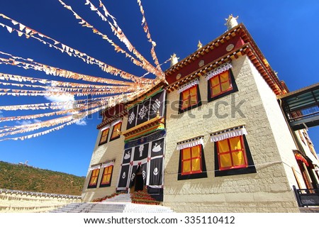Songzanlin Temple also known as the Ganden Sumtseling Monastery, is a Tibetan Buddhist monastery in Zhongdian city( Shangri-La), Yunnan province China and is closely Potala Palace in Lhasa Royalty-Free Stock Photo #335110412