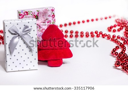 Christmas presents red beads background