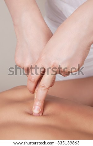 Trigger point therapy Royalty-Free Stock Photo #335139863