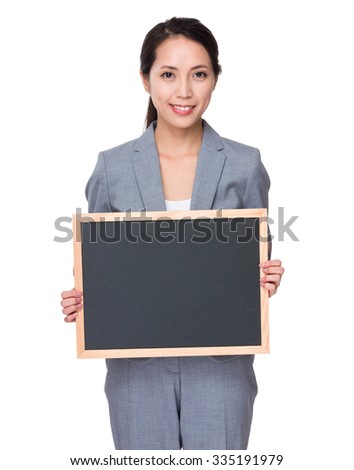 Asian Businesswoman show with blank chalkboard