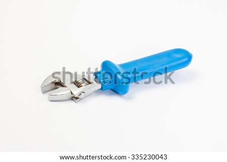 Close up new universal alligator wrench, spanner tool on white background