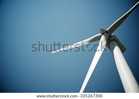 Windmill for electric power production, Burgos Province, Castilla Leon, Spain. Royalty-Free Stock Photo #335267300