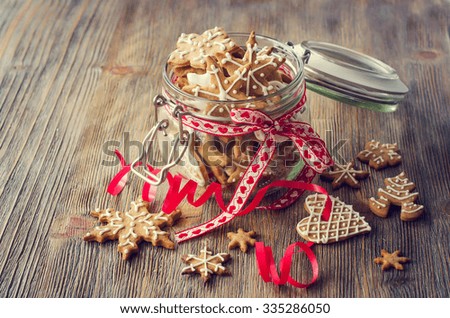 Traditional christmas cookies with icing, festive vintage table decoration